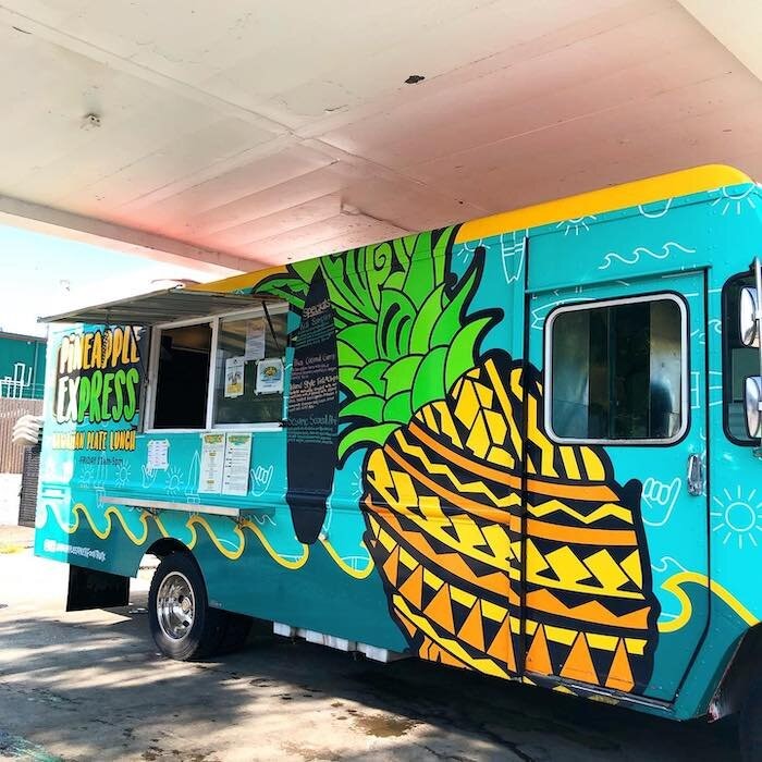 Pineapple Express food truck with a large pineapple mural