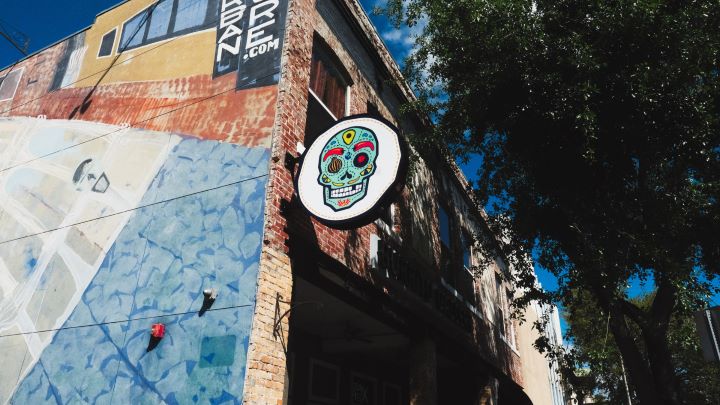 Burrito Gallery restaurant storefront with mural and sign