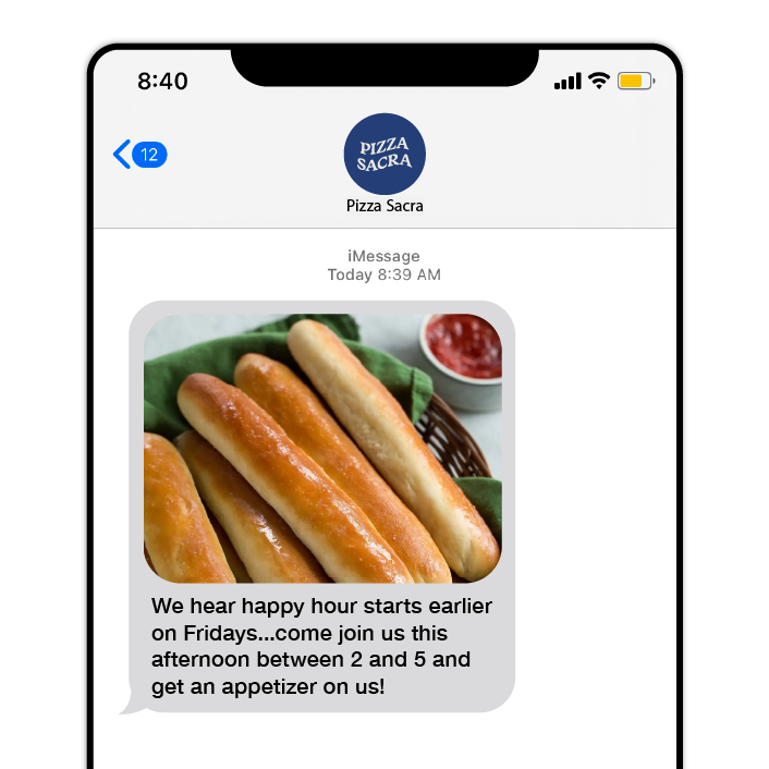 Text message from Pizza Sacra offering a free appetizer during happy hour