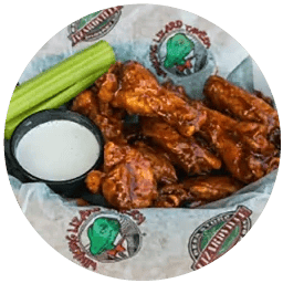 A basket of wings and celery at Winking Lizard Tavern