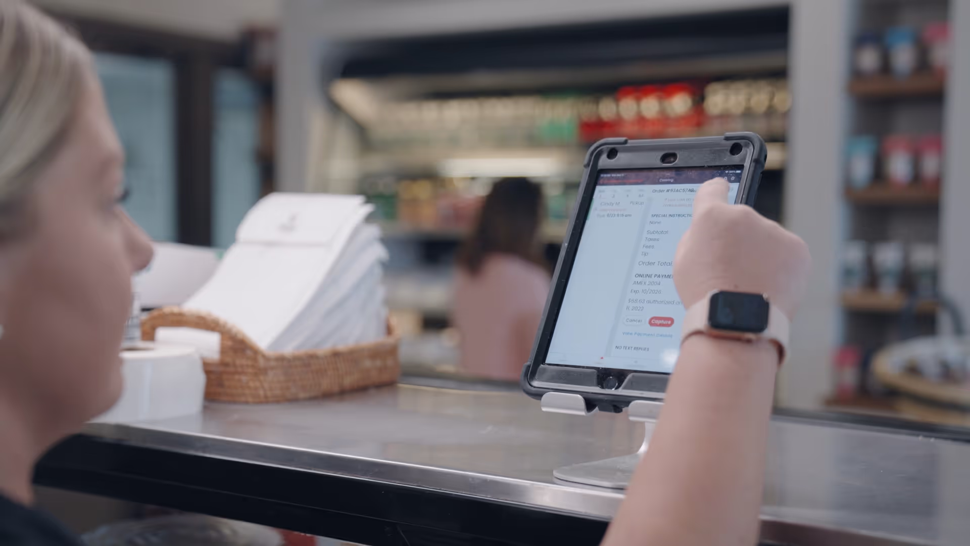 Restaurant staff using a POS system